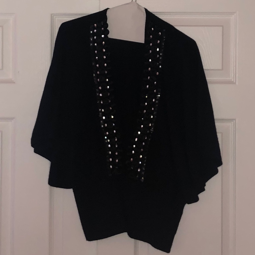 Sweater with cape sleeves